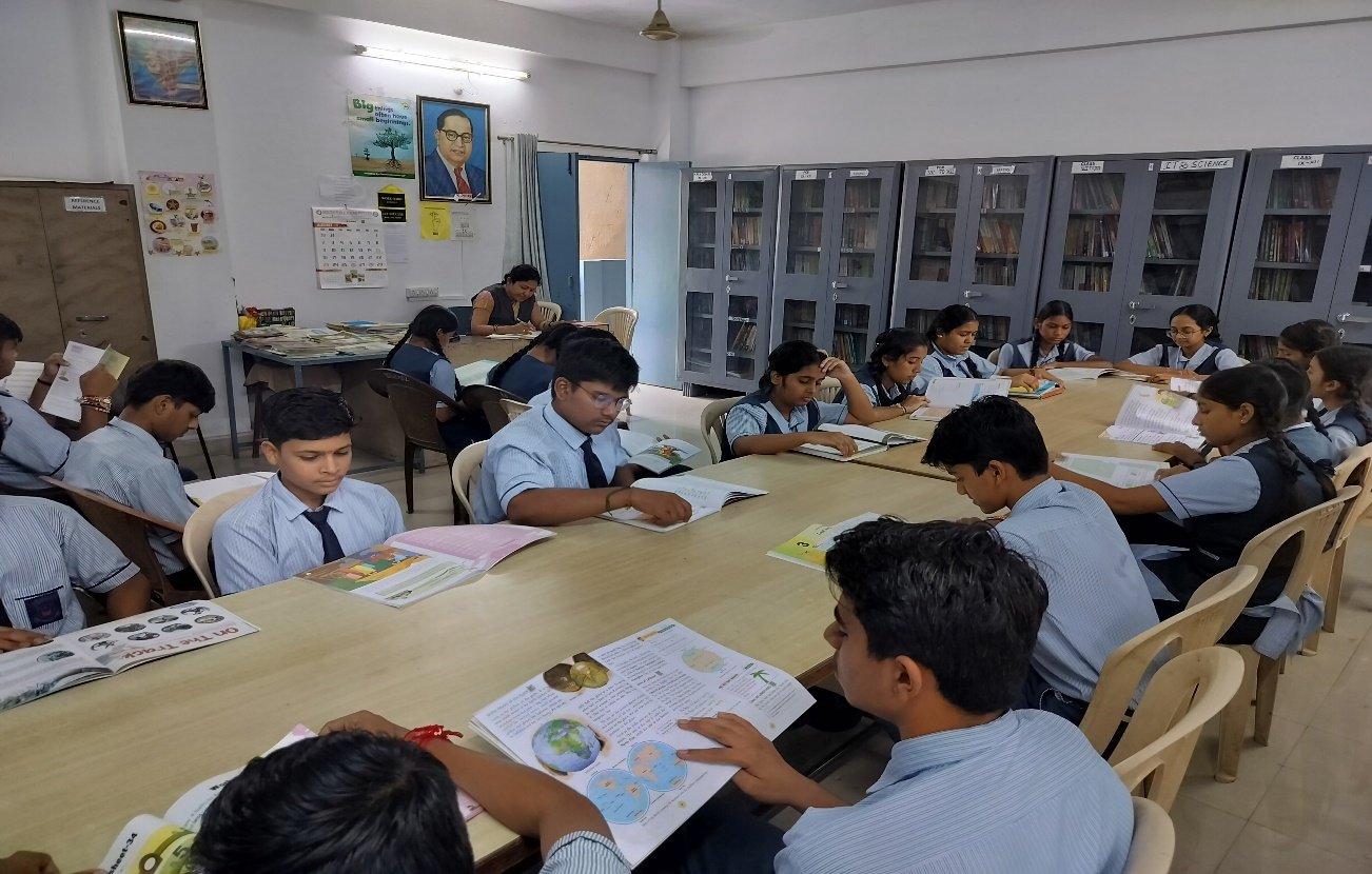 RGHSS students reading together in the school library